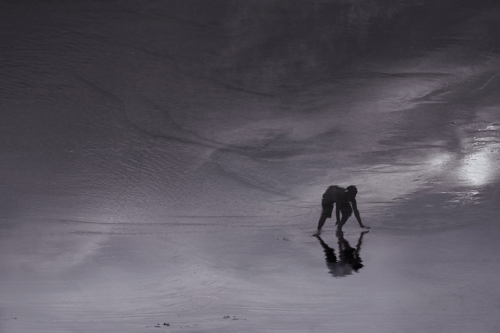 © Htet T San
