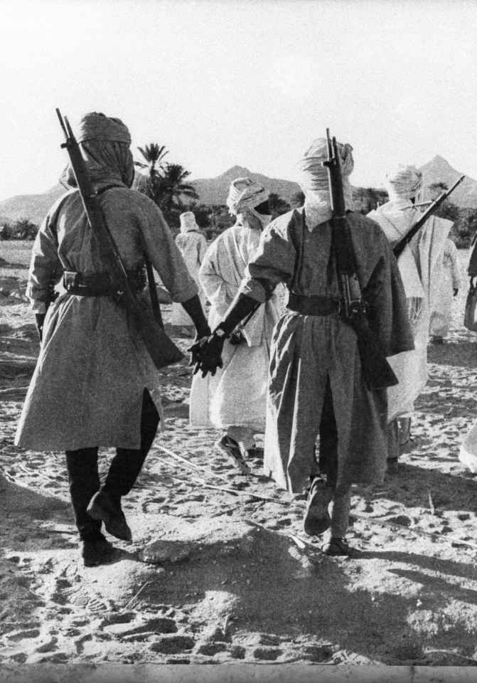 01 Jan 1977 --- Chadian rebels train in the Tibesti Mountains in northern Africa. In 1960, Chad gained its independence from France, but the country fell into civil war which grew into a conflict with Libya in the 1980s. --- Image by © Christine Spengler/Sygma/Corbis